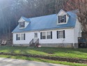 Wow! Such A  cute home with a huge opportunity to finish the for sale in Canton North Carolina Haywood County County on GolfHomes.com