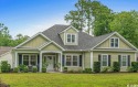 You will find quality and value in this nicely laid out low for sale in Pawleys Island South Carolina Georgetown County County on GolfHomes.com