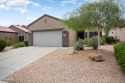 Resort-style living in one of Sun City Grand's most sought-after for sale in Surprise Arizona Maricopa County County on GolfHomes.com