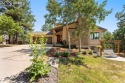 Nestled on a serene cul-de-sac and backing to open space, this for sale in Monument Colorado El Paso County County on GolfHomes.com