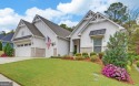 DUNWOODY Model  Covered front porch with brick elevation.  This for sale in Hoschton Georgia Gwinnett County County on GolfHomes.com