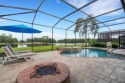 WATER VIEW POOL HOME!  GOLF CART included! Amazing water view for sale in Davenport Florida Polk County County on GolfHomes.com