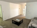 Move-in ready 2 bedroom 1 bathroom coop with newer A/C unit for sale in Tucson Arizona Pima County County on GolfHomes.com