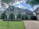 Nestled within the serene and sought-after golf course community for sale in Olive Branch Mississippi Desoto County County on GolfHomes.com