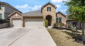 Nestled in the sought-after Crystal Falls community, this for sale in Leander Texas Travis County County on GolfHomes.com