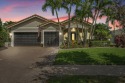 Set on the 1st fairway of Hammock Creek's Jack Nicklaus course for sale in Palm City Florida Martin County County on GolfHomes.com