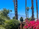 FINALLY, a side yard with a beautiful view straight down the for sale in Palm Desert California Riverside County County on GolfHomes.com