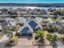 Expansive lake front property, across from golf course in sought for sale in Granbury Texas Hood County County on GolfHomes.com