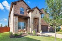 Gorgeous two-story brick home with stone accents, located near for sale in Fort Worth Texas Tarrant County County on GolfHomes.com
