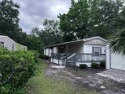 *Price Improvement* Welcome to the Beachlife on a scenic for sale in Murrells Inlet South Carolina Horry County County on GolfHomes.com