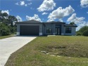 Amazing location! Home features 3 bedrooms, 3 full bathrooms, 2 for sale in Lehigh Acres Florida Lee County County on GolfHomes.com