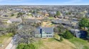 Welcome to 103 Longhorn, a spacious and thoughtfully designed for sale in Lake Kiowa Texas Cooke County County on GolfHomes.com