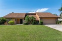 SPACIOUS POOL HOME OVERLOOKING GOLF COURSE IN LAKE SUZY for sale in Lake Suzy Florida Desoto County County on GolfHomes.com