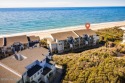Welcome to this beautifully updated, oceanfront, 4-bedroom for sale in Pine Knoll Shores North Carolina Carteret County County on GolfHomes.com
