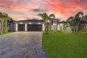 Stunning New Construction Home on Gulf-Access Canal with Canal for sale in Cape Coral Florida Lee County County on GolfHomes.com