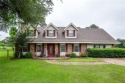 Love a golf-course backdrop? This 4BR/3BA Timber Trails home for sale in Pineville Louisiana Rapides Parish County on GolfHomes.com