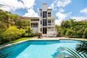 One of a kind Home in Kalama Valley, this spacious 4-bedroom for sale in Honolulu Hawaii Oahu  County County on GolfHomes.com