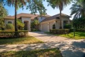 Perfectly located on a corner lot in the highly sought-after for sale in Windermere Florida Orange County County on GolfHomes.com