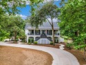 Nestled on a serene 1.88 acre wooded lot, enjoy resort-style for sale in Georgetown South Carolina Georgetown County County on GolfHomes.com