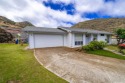 Fresh, breezy single-level comfort at one of Kalama Valley's for sale in Honolulu Hawaii Oahu  County County on GolfHomes.com