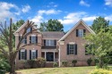 This stately, brick front home in popular Brier Creek golf for sale in Raleigh North Carolina Wake County County on GolfHomes.com
