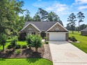 This stunning all-brick home in the sought-after Long Bay Golf for sale in Longs South Carolina Horry County County on GolfHomes.com