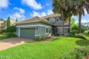 NO EXPENSE SPARED in this absolutely stunning lakefront home for sale in Ormond Beach Florida Volusia County County on GolfHomes.com