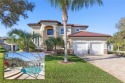 Experience luxurious living in this stunning Mediterranean for sale in Palm Coast Florida Flagler County County on GolfHomes.com