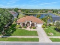Private lakefront oasis in the gated community of Sabal Creek for sale in Port Orange Florida Volusia County County on GolfHomes.com