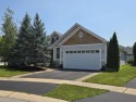 An INVITING front porch and PEACEFUL water feature greets you at for sale in Huntley Illinois Mchenry County County on GolfHomes.com