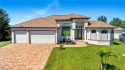 Built in 2023, this immaculate home offers soaring 14-ft for sale in Port Charlotte Florida Charlotte County County on GolfHomes.com