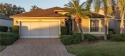 CHECK OUT THIS GOLF COURSE VIEW OF THE 14TH HOLE!! This open for sale in Estero Florida Lee County County on GolfHomes.com