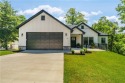 Welcome to this lovely 2-year-old home nestled in a quiet for sale in Bella Vista Arkansas Benton County County on GolfHomes.com