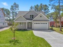 This exceptional new lakefront home by Langbeen Builders, Inc for sale in Southport North Carolina Brunswick County County on GolfHomes.com