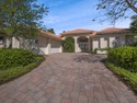 THIS GRACIOUS CUSTOM HOME HAS A GOLF MEMBERSHIP, GOLF AND LAKE for sale in Palm Beach Gardens Florida Palm Beach County County on GolfHomes.com