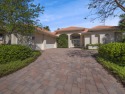 THIS GRACIOUS CUSTOM HOME HAS A GOLF MEMBERSHIP, GOLF AND LAKE for sale in Palm Beach Gardens Florida Palm Beach County County on GolfHomes.com