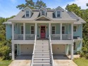 Coastal Elegance in The Arboretum - Custom-Built 4BR Home with for sale in Caswell Beach North Carolina Brunswick County County on GolfHomes.com