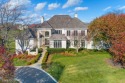 Experience refined elegance in this luxurious, all-brick estate for sale in North Barrington Illinois Lake County County on GolfHomes.com