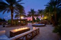 This tropical backyard oasis is a true showstopper! An oversized for sale in Gilbert Arizona Maricopa County County on GolfHomes.com