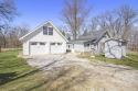 Nestled in a picturesque setting, this adorable home offers for sale in Gregory Michigan Washtenaw County County on GolfHomes.com