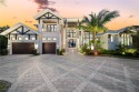 Set in the heart of Naples, this remarkable waterfront estate for sale in Naples Florida Collier County County on GolfHomes.com