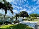 Dive into the serene life of your dreams at 902 McDaniels St for sale in Sun City Center Florida Hillsborough County County on GolfHomes.com