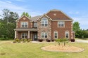 This stunning home located in highly sought-after Crystal Lake for sale in Hampton Georgia Henry County County on GolfHomes.com