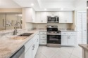 Priced to sell! Stunning First-Floor Renovated Turnkey Fully for sale in Naples Florida Collier County County on GolfHomes.com