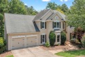 A remarkable one-of-a-kind home situated in the sought-after for sale in Woodstock Georgia Cherokee County County on GolfHomes.com