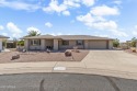 This oversized 2 bed / 2 bath home sits on an 18,000+ sq ft for sale in Sun City West Arizona Maricopa County County on GolfHomes.com