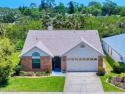 Welcome to your serene oasis! This beautifully appointed split for sale in New Smyrna Beach Florida Volusia County County on GolfHomes.com