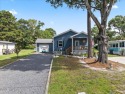 Welcome to 505 Magnolia Drive in peaceful 
Seaside Station. This for sale in Sunset Beach North Carolina Brunswick County County on GolfHomes.com