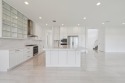 Brand New Lakefront Home | 5BD + In-Law Suite | Designer for sale in Boca Raton Florida Palm Beach County County on GolfHomes.com