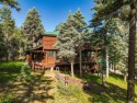 Tucked away amid whispering pines and just a short walk to the for sale in Angel Fire New Mexico Colfax County County on GolfHomes.com